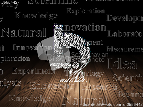 Image of Science concept: Microscope in grunge dark room