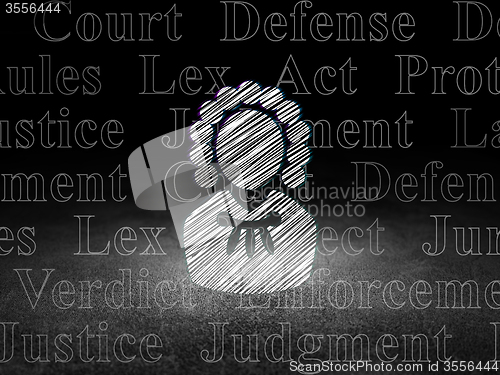 Image of Law concept: Judge in grunge dark room