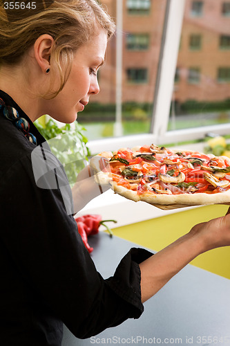 Image of Young Woman with Fresh Pizza