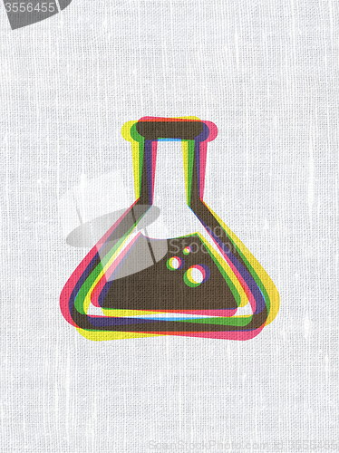 Image of Science concept: Flask on fabric texture background