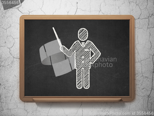 Image of Studying concept: Teacher on chalkboard background