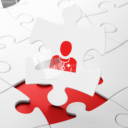 Image of Medicine concept: Doctor on puzzle background