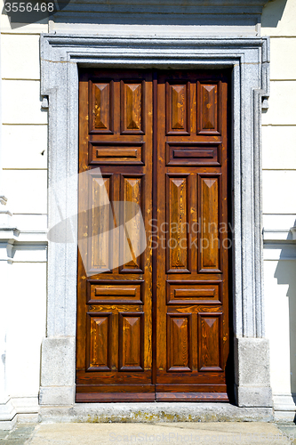 Image of abstract cross   brown knocker  varese italy azzatesumirago sunn