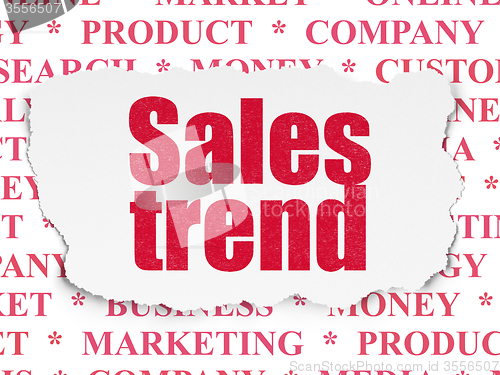Image of Advertising concept: Sales Trend on Torn Paper background