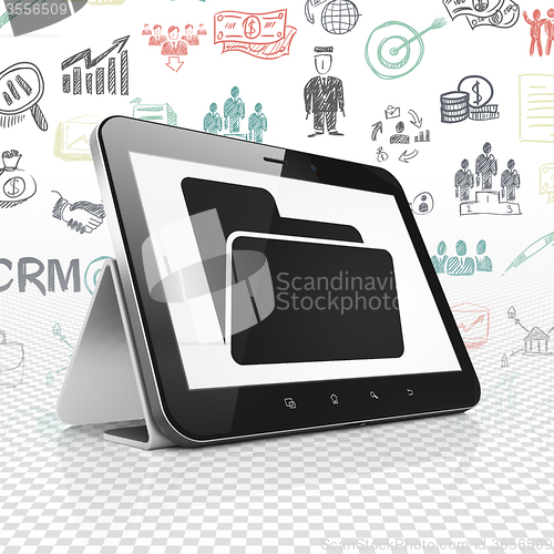 Image of Business concept: Tablet Computer with Folder on display