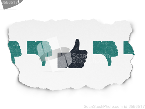 Image of Social network concept: thumb up icon on Torn Paper background