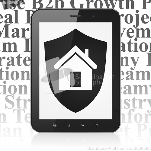 Image of Finance concept: Tablet Computer with Shield on display