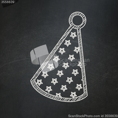 Image of Entertainment, concept: Party Hat on chalkboard background