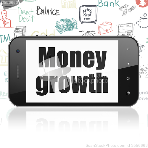 Image of Banking concept: Smartphone with Money Growth on display