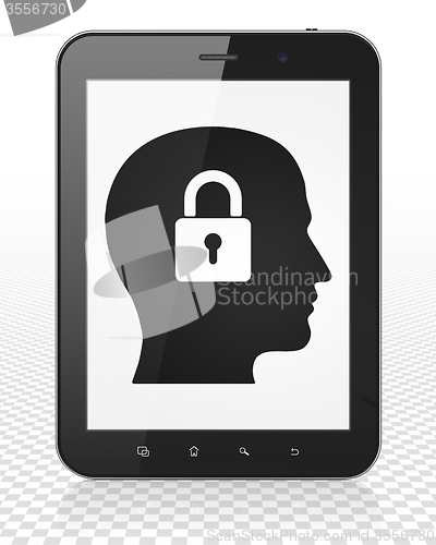 Image of Information concept: Tablet Pc Computer with Head With Padlock on display