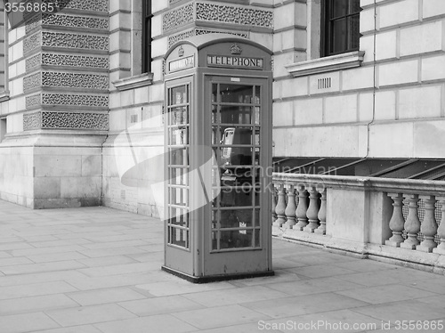 Image of Black and white Red phone box in London