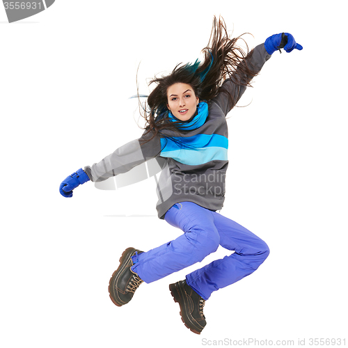 Image of Winter woman jumping