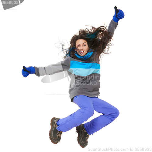 Image of Winter woman jumping