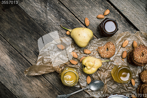 Image of pears Cookies honey and nuts on wood