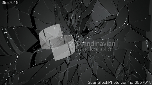 Image of Cracked and broken glass on black