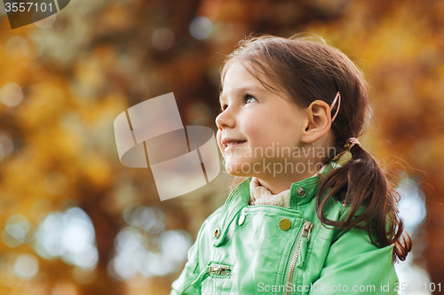 Image of happy beautiful little girl portrait outdoors