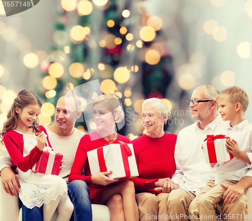 Image of smiling family with gifts