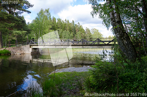 Image of one bridge with the lake