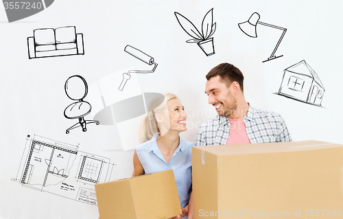 Image of couple with delivery boxes moving to new home