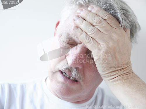 Image of man with dizziness and head pain 