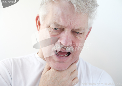 Image of sore throat in older man