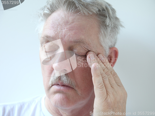 Image of older man with eye fatigue	