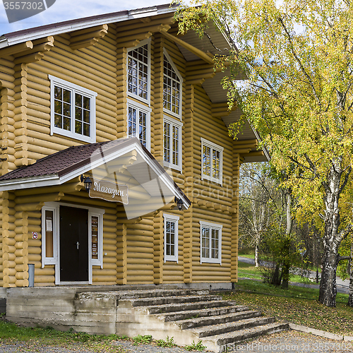 Image of Entrance of old style log house in country