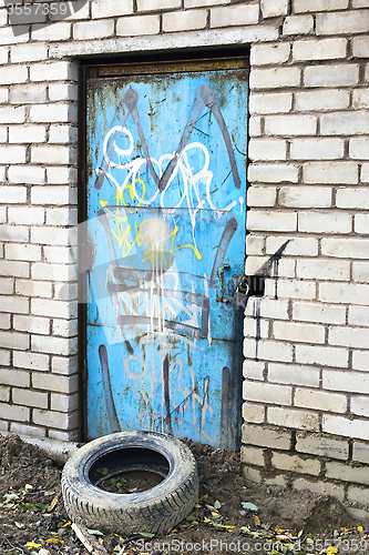 Image of Old door with scribbles