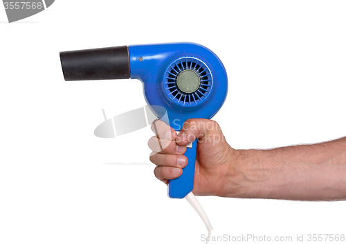 Image of Old blue hairdryer in hand