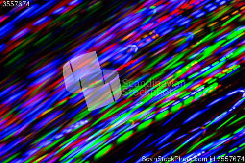 Image of colorful bright night lights over black background