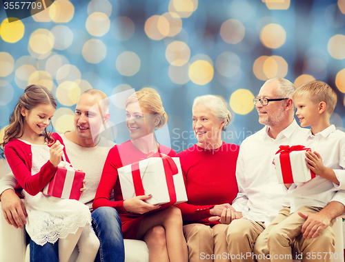 Image of smiling family with gifts