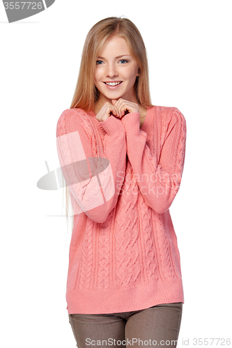 Image of Woman in pink sweater