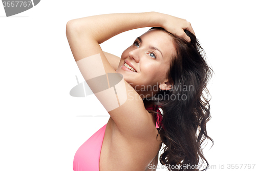 Image of happy young woman in pink swimsuit