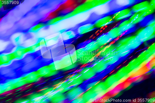 Image of colorful bright night lights over black background