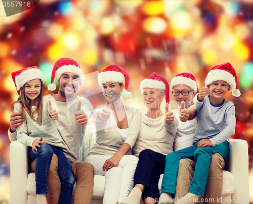 Image of happy family sitting on couch