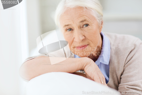 Image of happy senior woman face at home