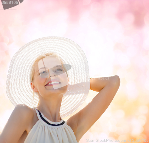 Image of beautiful woman enjoying summer outdoors