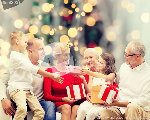 Image of smiling family with gifts