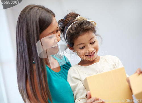 Image of happy mother and child with gift box