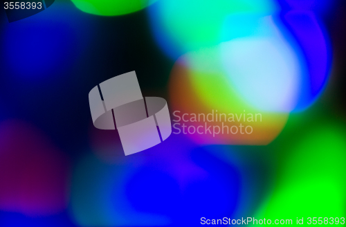 Image of colorful bright night lights over black background