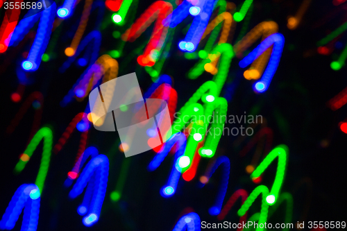 Image of colorful bright night lights over black background