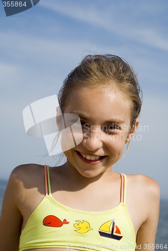 Image of Happy girl portrait on the beach