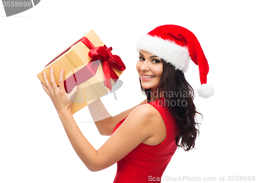 Image of beautiful sexy woman in santa hat with gift box