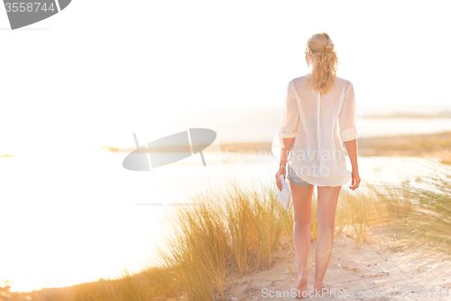 Image of Free Happy Woman Enjoying Sun on Vacations.