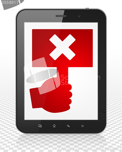 Image of Political concept: Tablet Pc Computer with Protest on display
