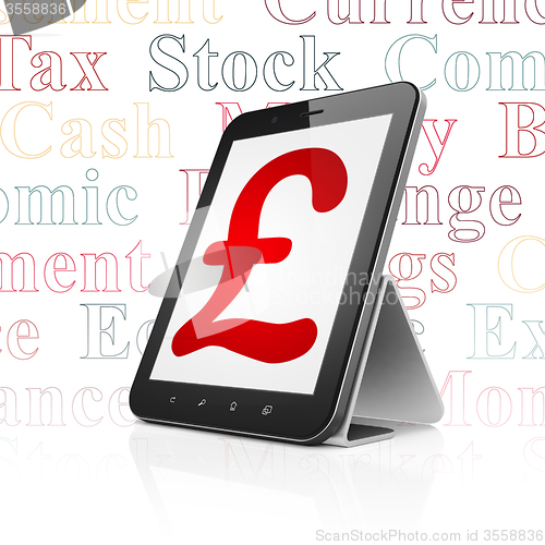 Image of Money concept: Tablet Computer with Pound on display