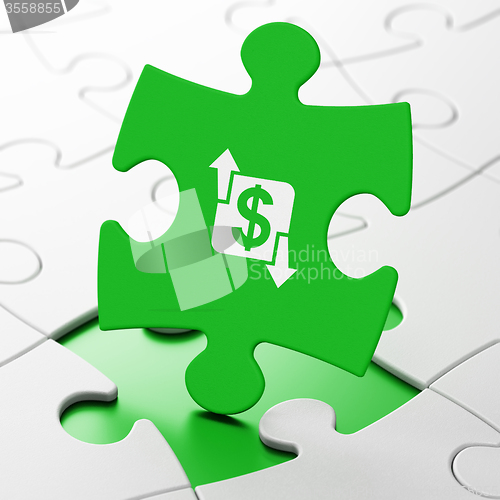 Image of Business concept: Finance on puzzle background