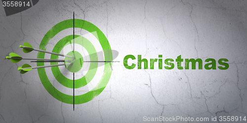 Image of Holiday concept: target and Christmas on wall background