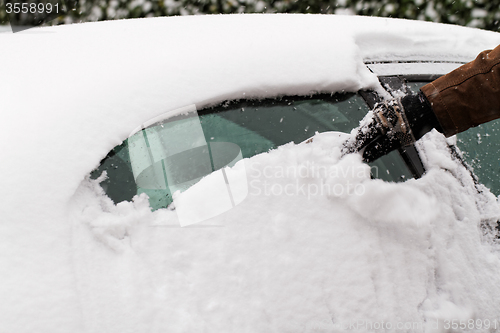 Image of Snowy car