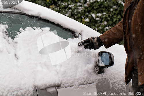 Image of Snowy car